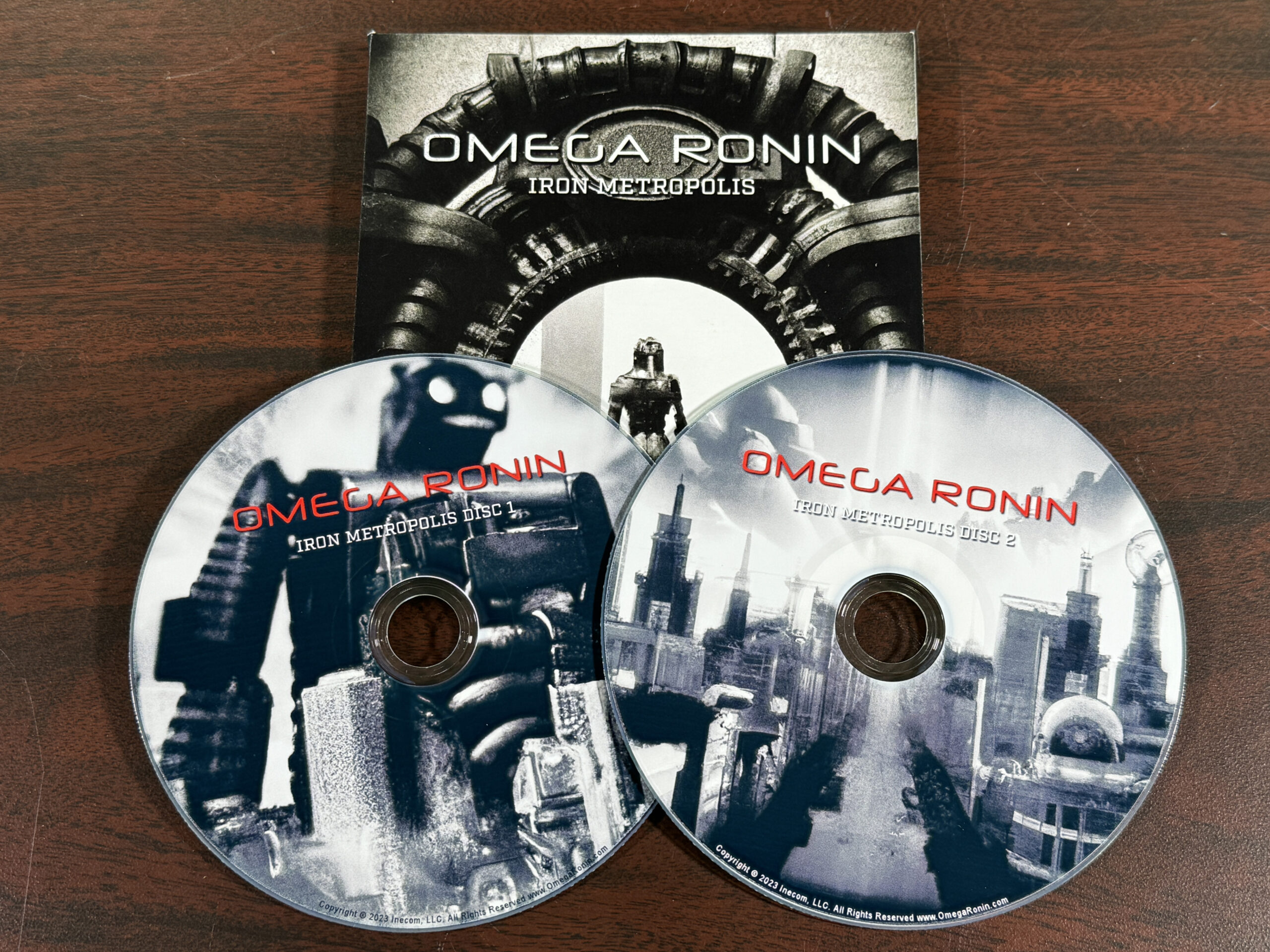 Omega Ronin: Iron Metropolis 2-CD Set with Discs